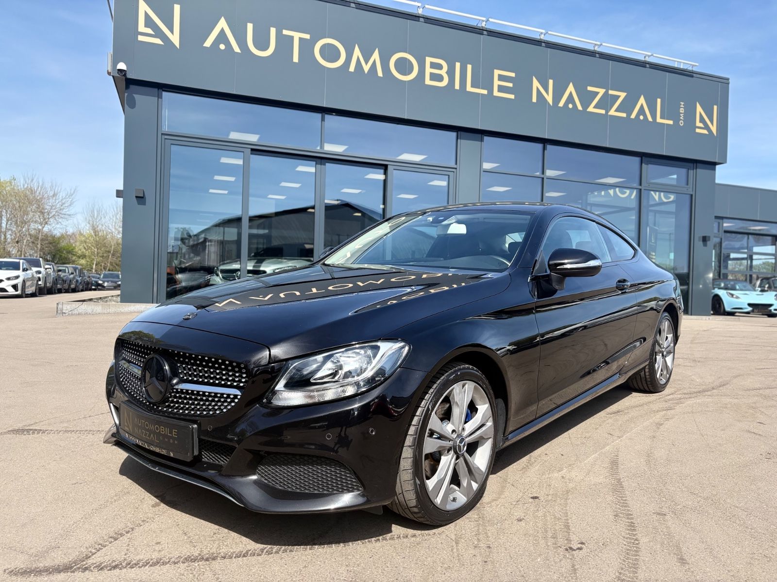 Mercedes-Benz C 200 Coupe *NAVI*TEILLEDER*PDC*