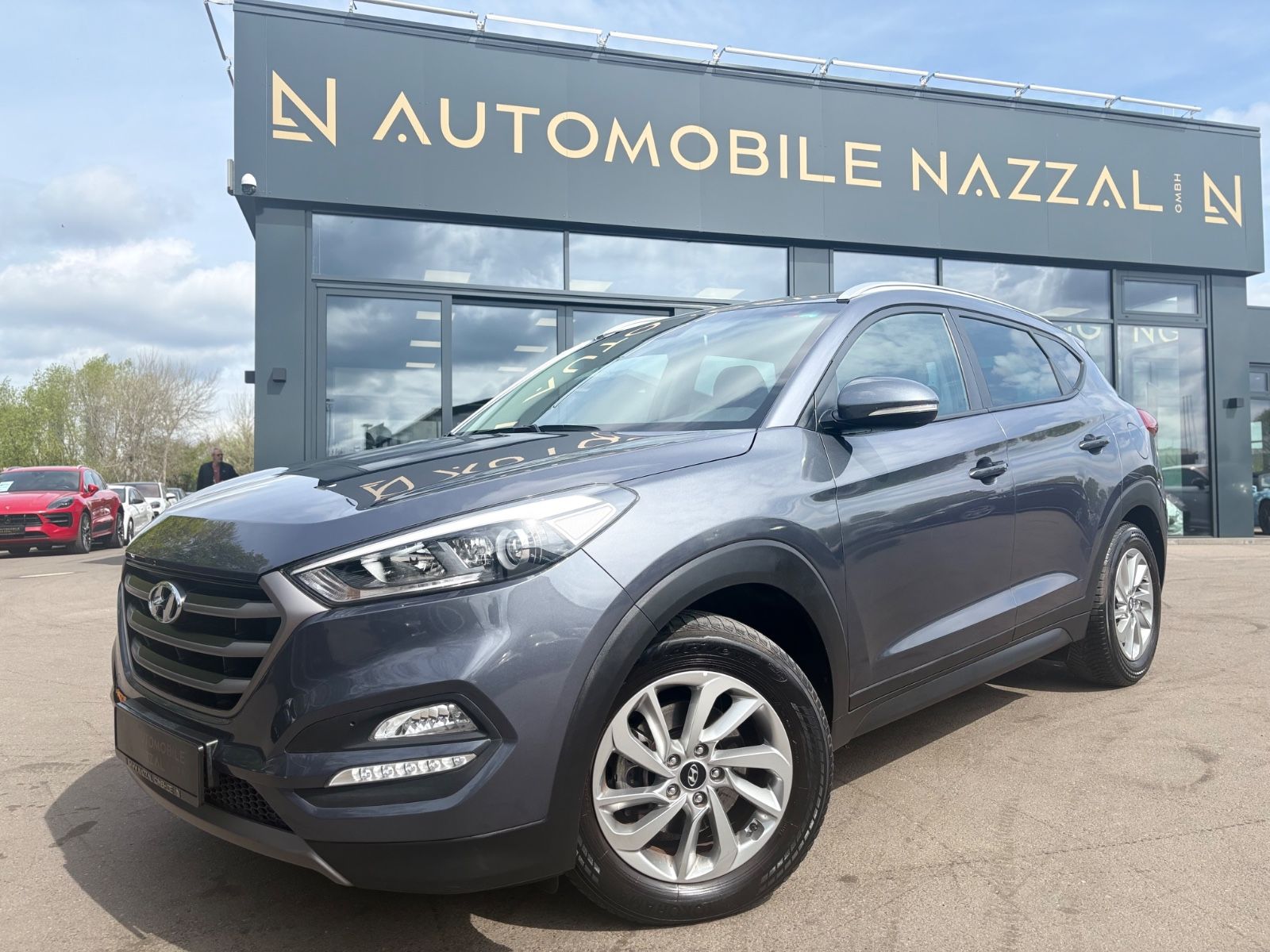Fahrzeugabbildung Hyundai TUCSON BLUE TREND*KAMERA*NAVI*SITZHEIZUNG*1.HAND