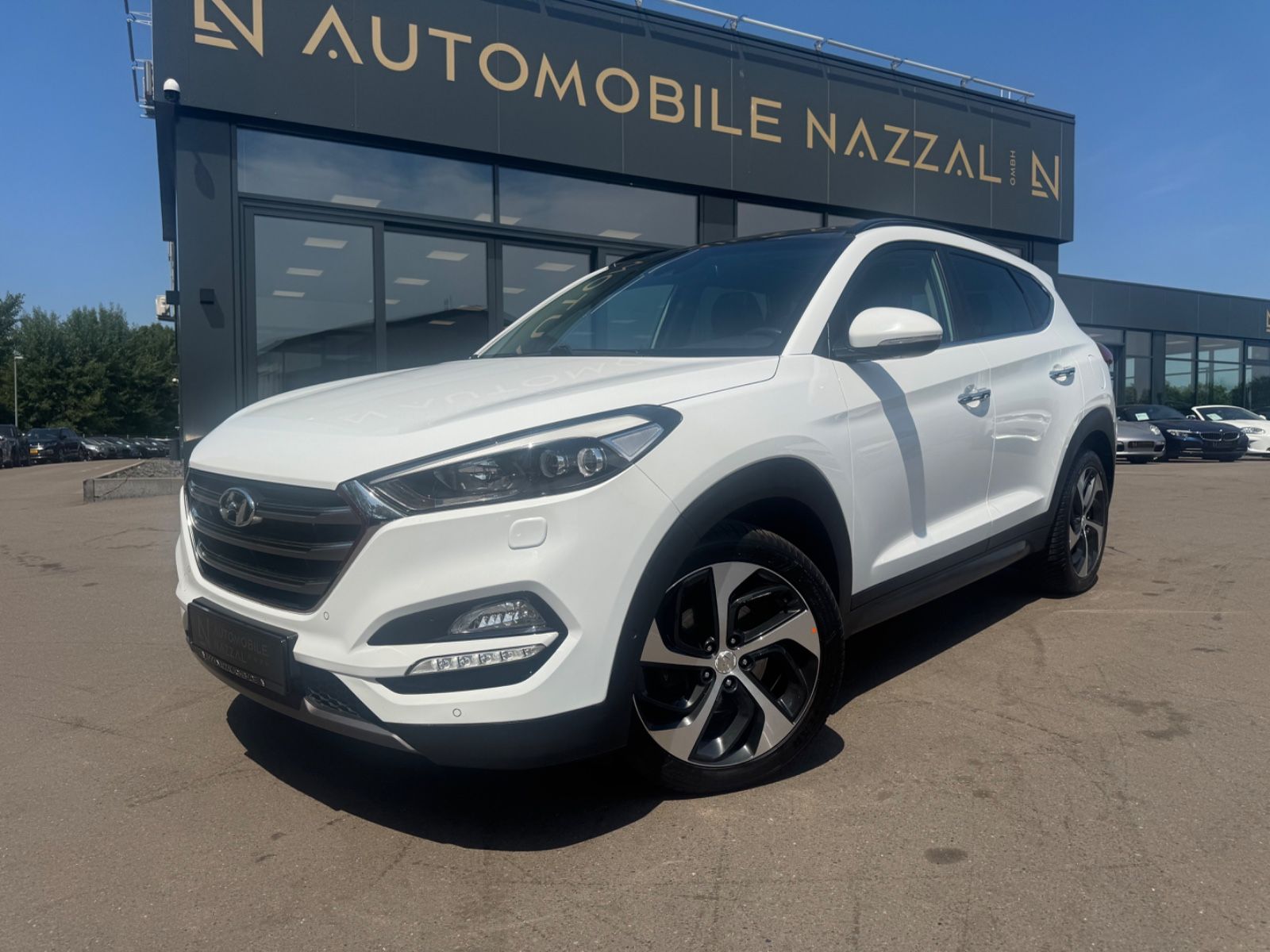 Fahrzeugabbildung Hyundai TUCSON PREMIUM 4WD *1.HD*AUT*LEDER*XENON*