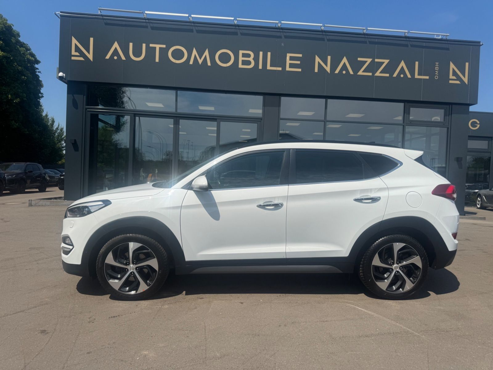 Fahrzeugabbildung Hyundai TUCSON PREMIUM 4WD *1.HD*AUT*LEDER*XENON*