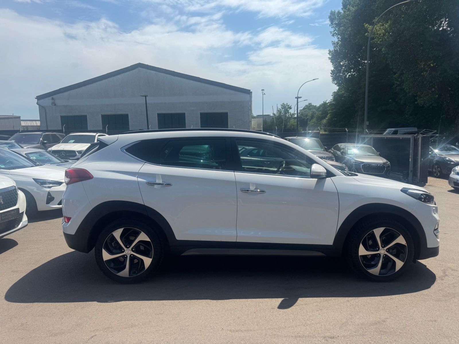 Fahrzeugabbildung Hyundai TUCSON PREMIUM 4WD *1.HD*AUT*LEDER*XENON*