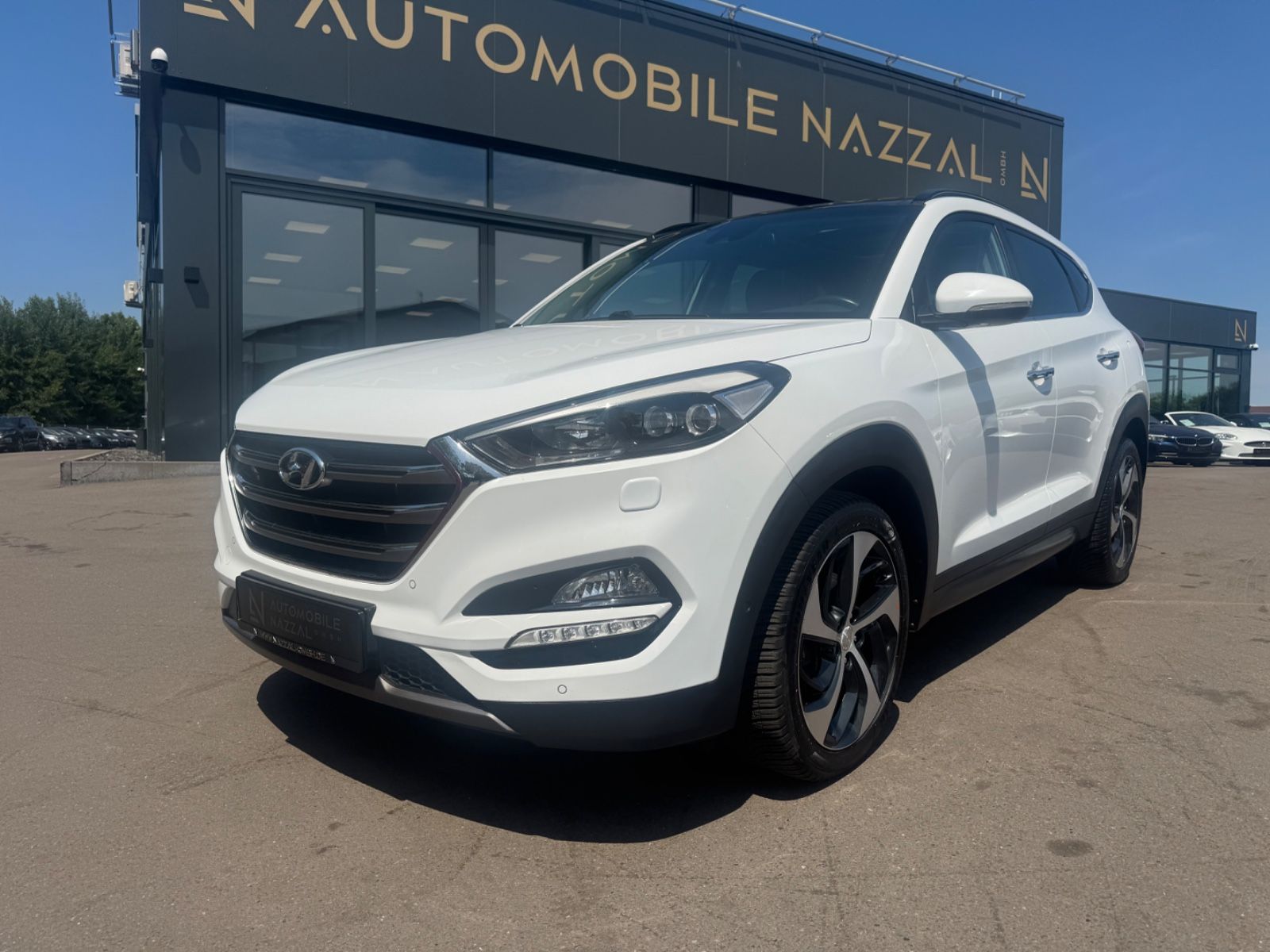 Fahrzeugabbildung Hyundai TUCSON PREMIUM 4WD *1.HD*AUT*LEDER*XENON*