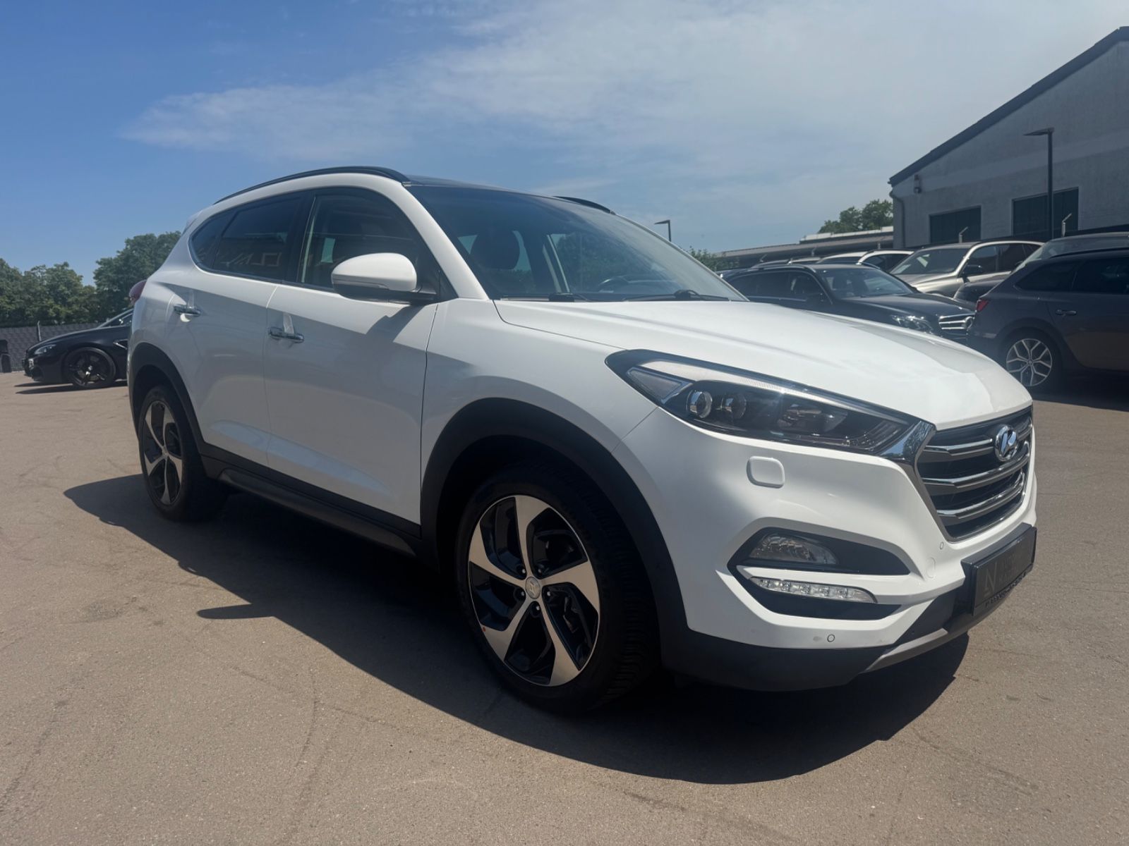 Fahrzeugabbildung Hyundai TUCSON PREMIUM 4WD *1.HD*AUT*LEDER*XENON*